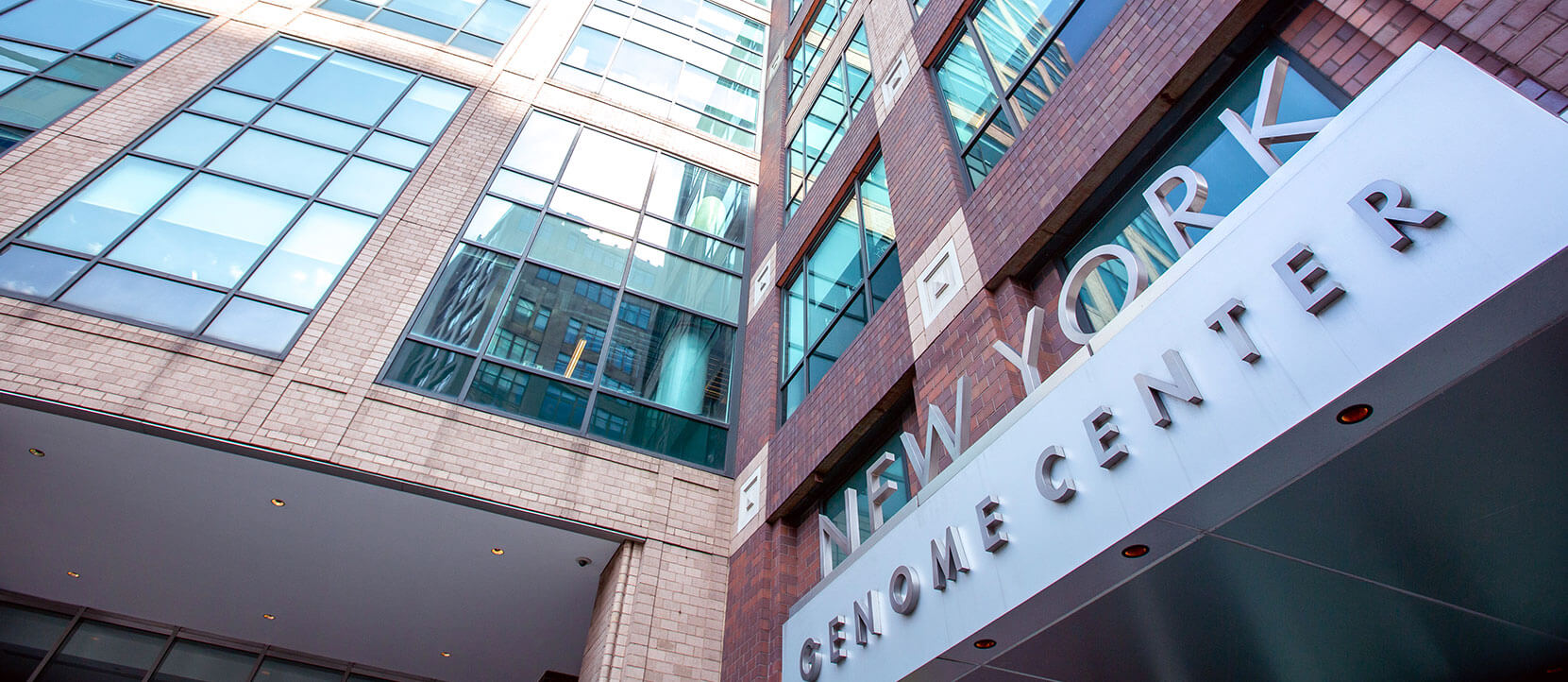 View of the signage above the entrance of the New York Genome Center